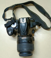 Load image into Gallery viewer, Used Nikon D3000 10.2MP Digital SLR Camera with 18-55mm f/3.5-5.6G AF-S DX VR Nikkor Zoom Lens
